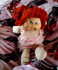Soft Body Baby Girl Doll, Blue Eyes, Red Curly Hair, Light Complexion