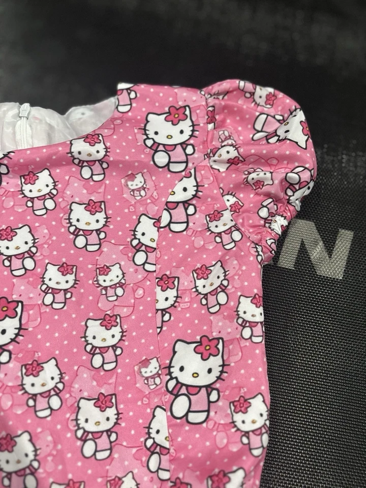 Vestido hecho a mano a lunares con lazos de Hello Kitty para niñas talla mediana Foto 3 de 4