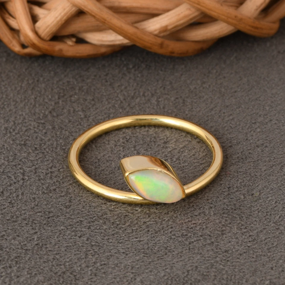 Anillo de compromiso de oro puro de 9k para ella con ópalo marquesa genuino Foto 2 de 4
