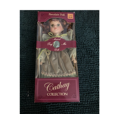 Cathay Collection Musical Try Me Porcelain Girl Doll Blue Eyes Brown Curly Hair