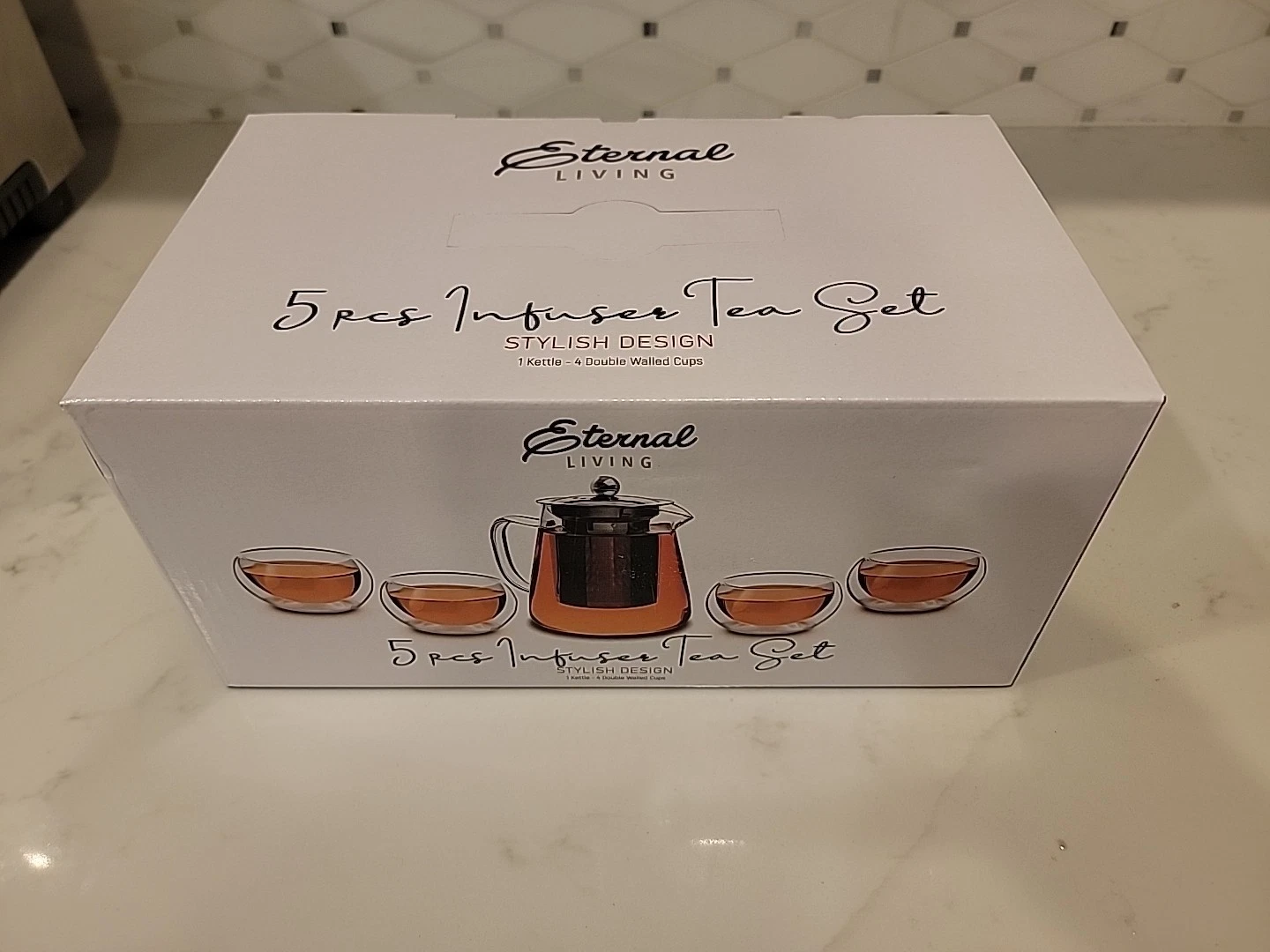 Eternal Living 5 PCS Infuser Tea Set. 1 Kettle 15 oz 4 Doubled Walled Cups 5 oz.
Opens in a new wind