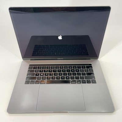 MacBook Pro 15 Touch Bar Space Gray 2019 2.4 GHz i9 32GB 2TB Pro 560X Blue Spots