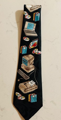 Computer retro Tie computer themed tie features an allover repeat design