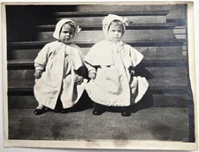 Vintage Found Photo Two Goofy Art Deco Babies Bonnets White Dresses on Stairs