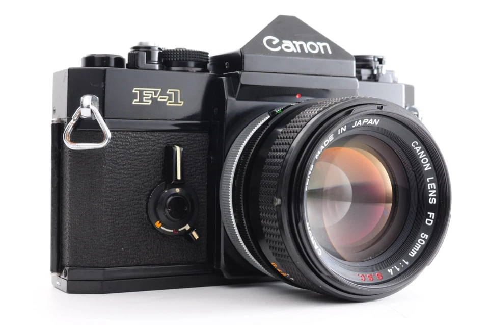 Modelo temprano **CASI COMO NUEVO-** Canon F-1 SLR + FD 50mm f/1.4 S.S.C. + Gorra de Japón Foto 2 de 4