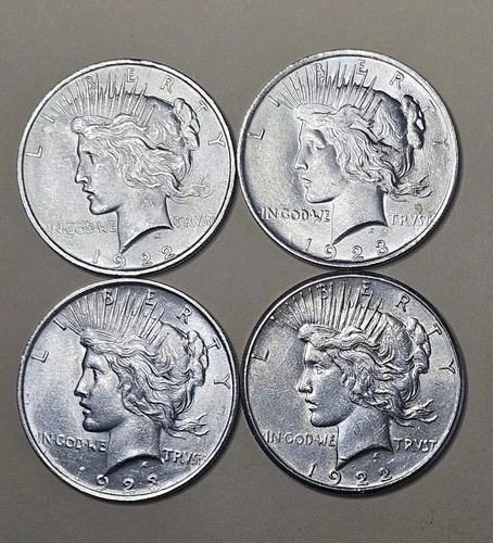 Lot of 4: Silver Peace Dollars. 1922-P, 1922-S, 2 of 1923-P. 90% fine, $4 Face