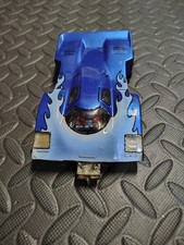 1/24 slotcar, narrow chassis, Eagle 50K RPM motor. Tires trued.