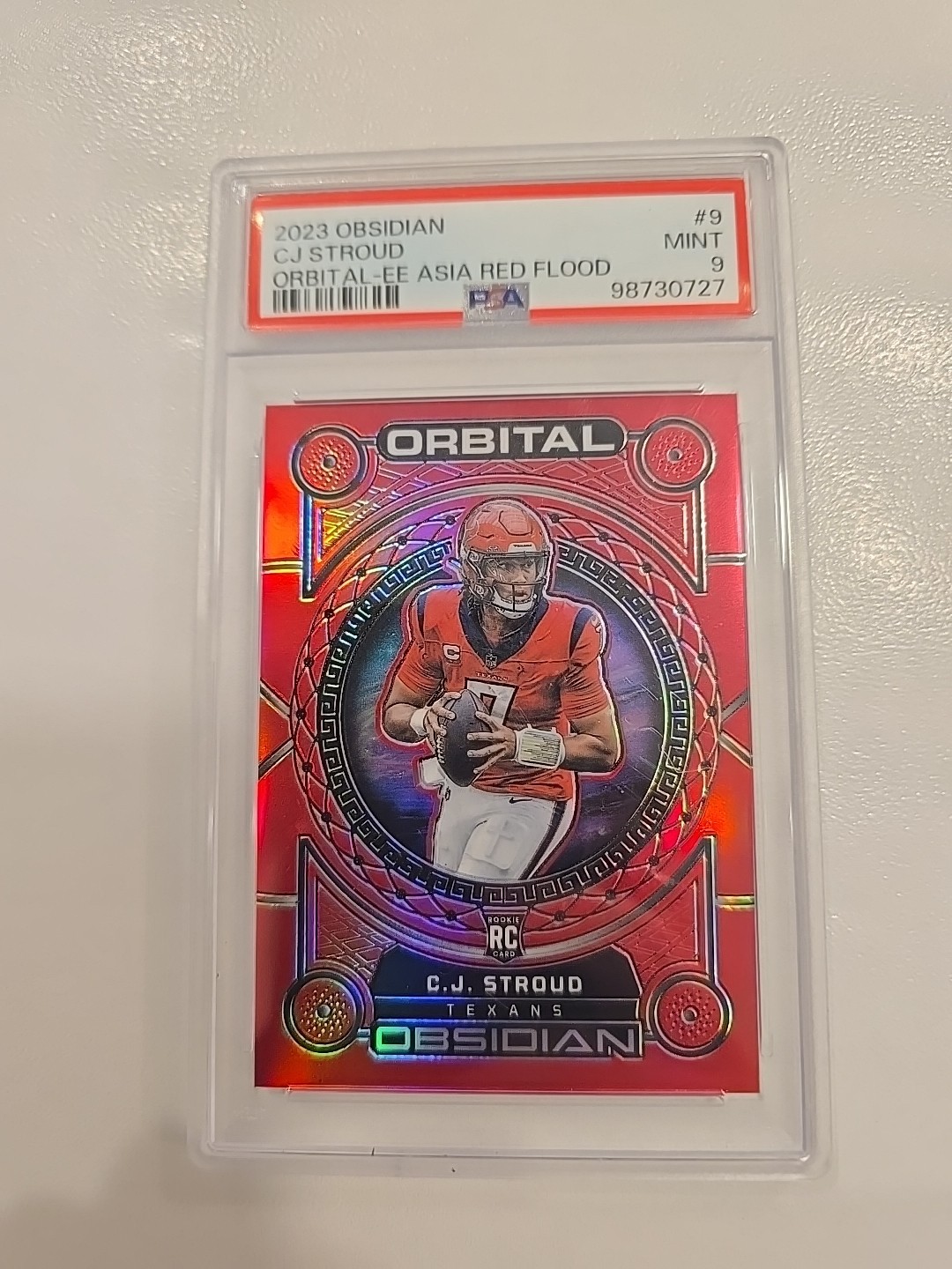 2023 Obsidian Orbital Asia Red Flood Electric Etch CJ Stroud QB #9 PSA 9