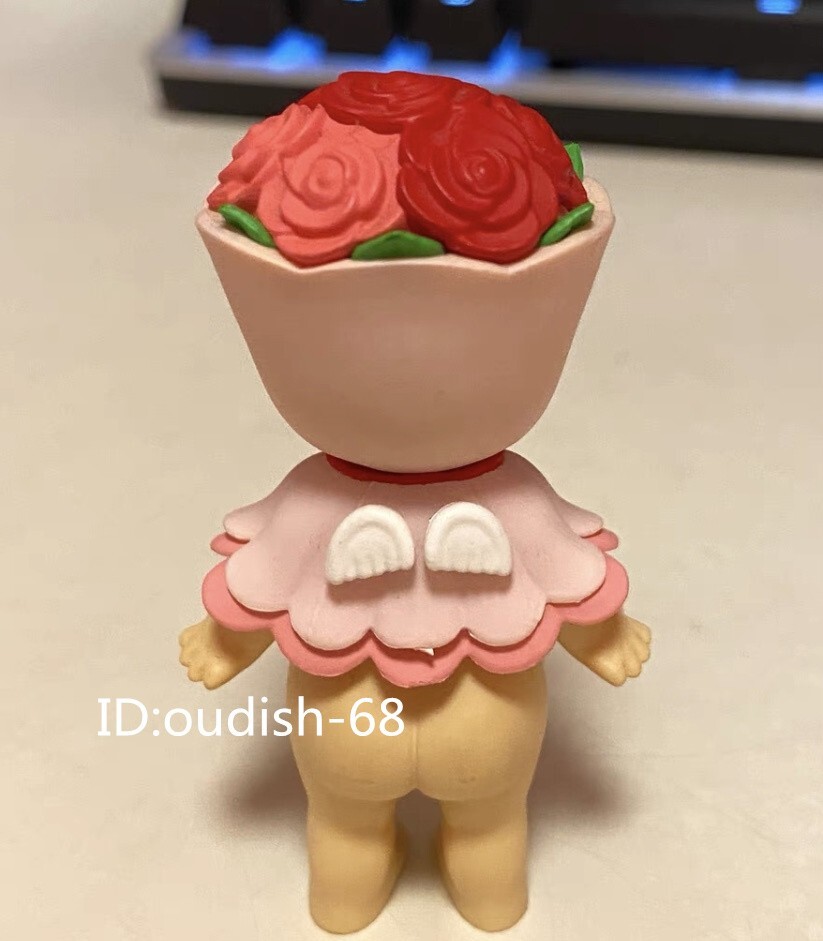 Figurine rose fluorescent personnage enfant bébé miniature