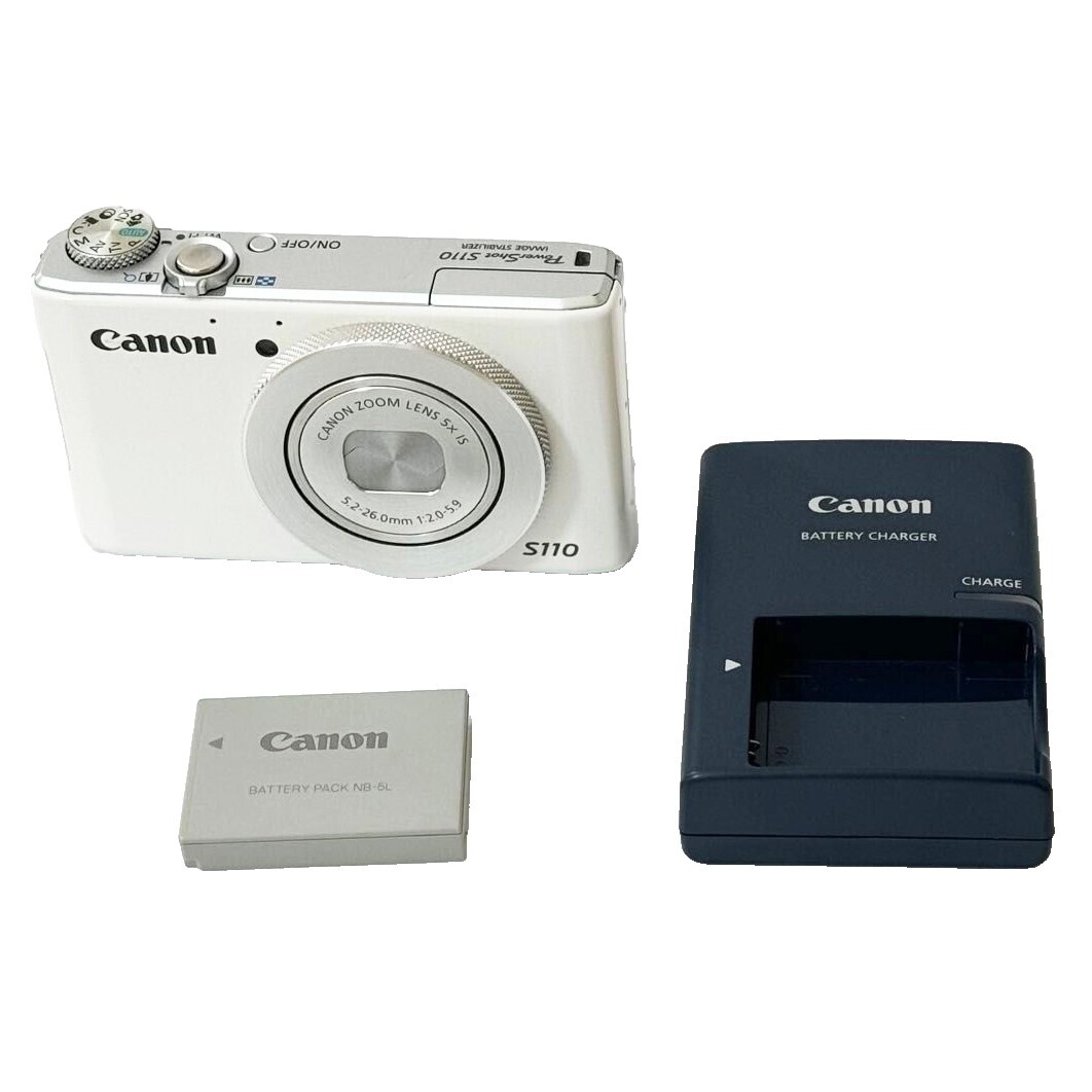 Preços baixos em Câmeras digitais Canon PowerShot A520 com Carimbo