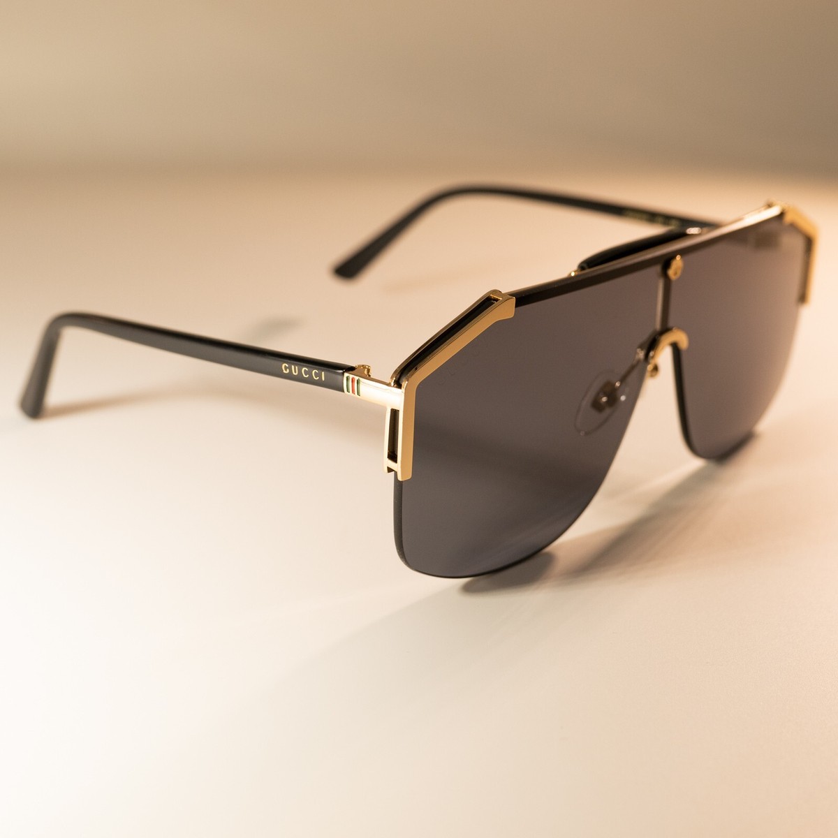 Gucci GG04682 001 Black and Gold Sunglasses Gucci GG 0882SA 001 Gold Metal Oversized Sunglasses Grey  main image 2
