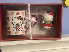 Hello Kitty Ceramic strawberry mug and figuri...