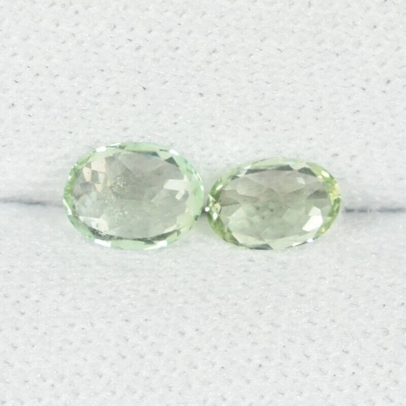 0.60 ct RARE COLLECTOR'S MINT GREEN NATURAL KORNERUPINE  Oval 2pc See Vdo DB - Image 2 of 3