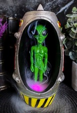UFO Green Alien In Spaceship Capsule Backflow...