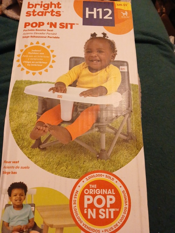 Bright Starts Pop 'N Sit New Plus a bubble machine.