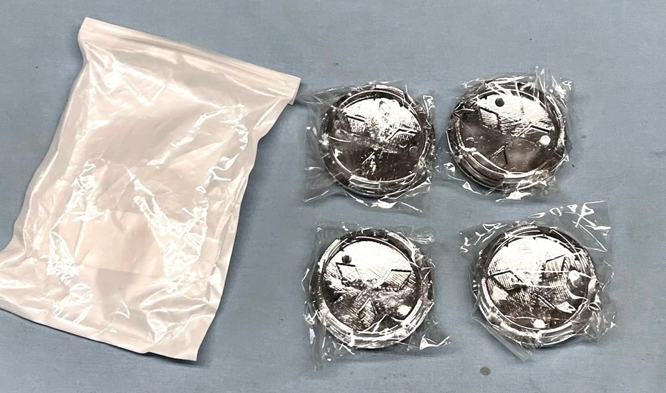 NOVAS TAMPAS DE CENTRO DE RODA MITSUBISHI CROMADAS/PRATA 4 x 60mm ECLIPSE MIRAGE OUTLANDER - Imagem 4 de 4