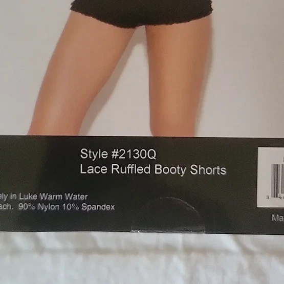 Botín corto con volantes Queen Foto 2 de 4