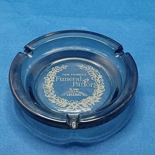 Tom Powells Funeral Parlor Black Glass Ashtray- The Unique Underground Orleans.