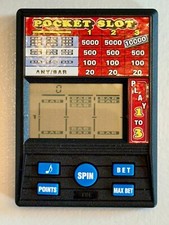 Radica Pocket Slot Model 1370 Handheld Electronic Casino Game TESTED WORKING