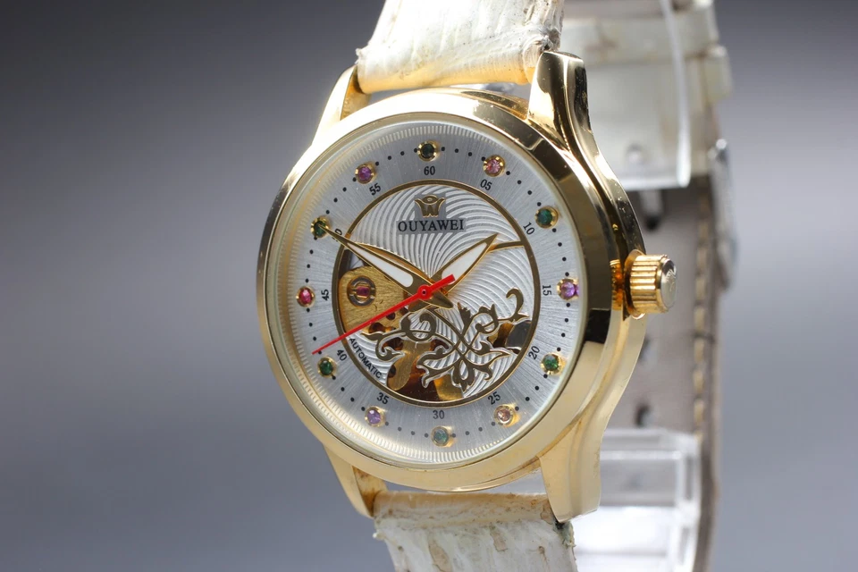 Reloj automático para hombre casi como nuevo OUYAWEI dorado plata piedras coloridas de JAPÓN Foto 2 de 4