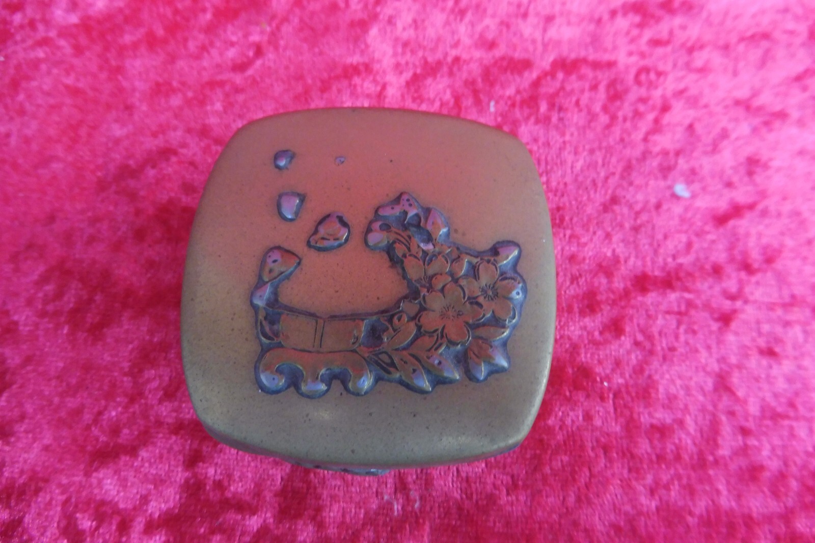 Antique brass lidded box with intricate relief decorations