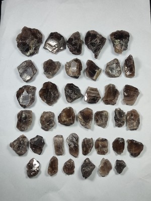 315 gm Aesthetic Transparent Dark Brown Rough Axinite Crystals Lot From Skardu.