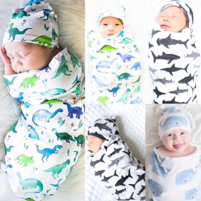 boy swaddles