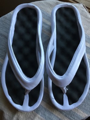 white foam flip flops