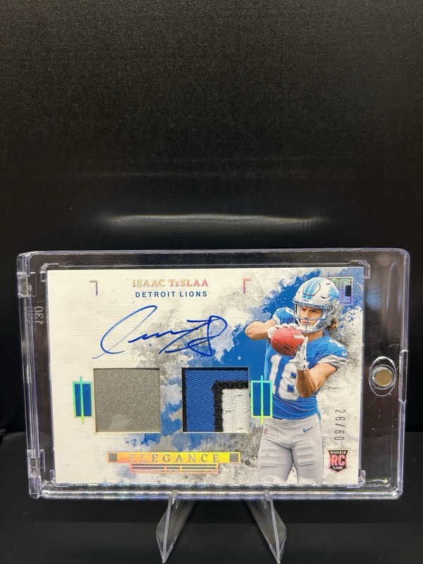 2025 Panini Impeccable  Elégance Rookie Helmet and Patch Auto Isaac Teslaa RPA