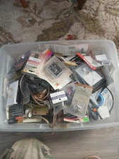 box of miscellaneous audio and video accessories