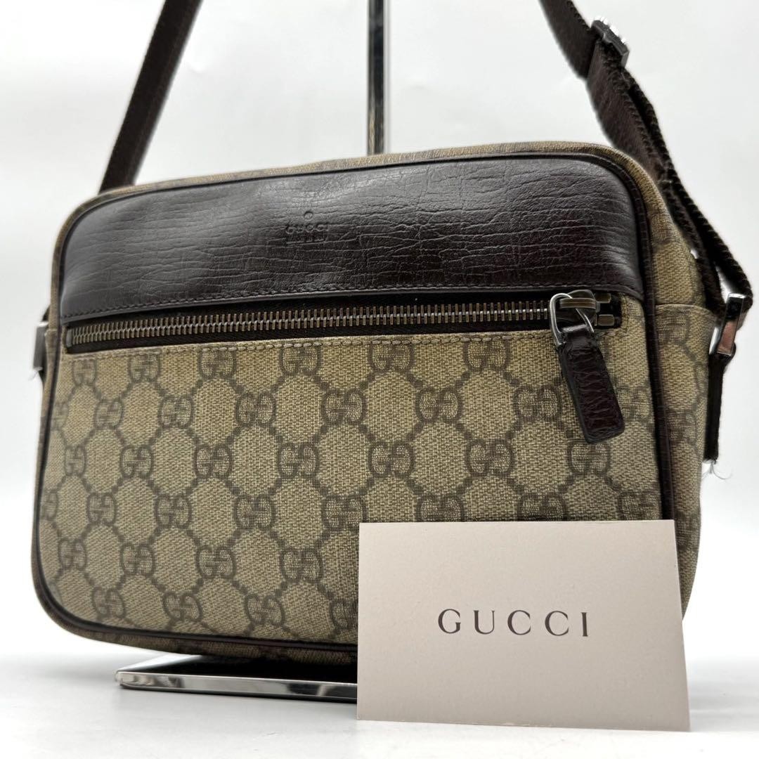 GUCCI GG Supreme Embossed Leather Shoulder Bag in PVC