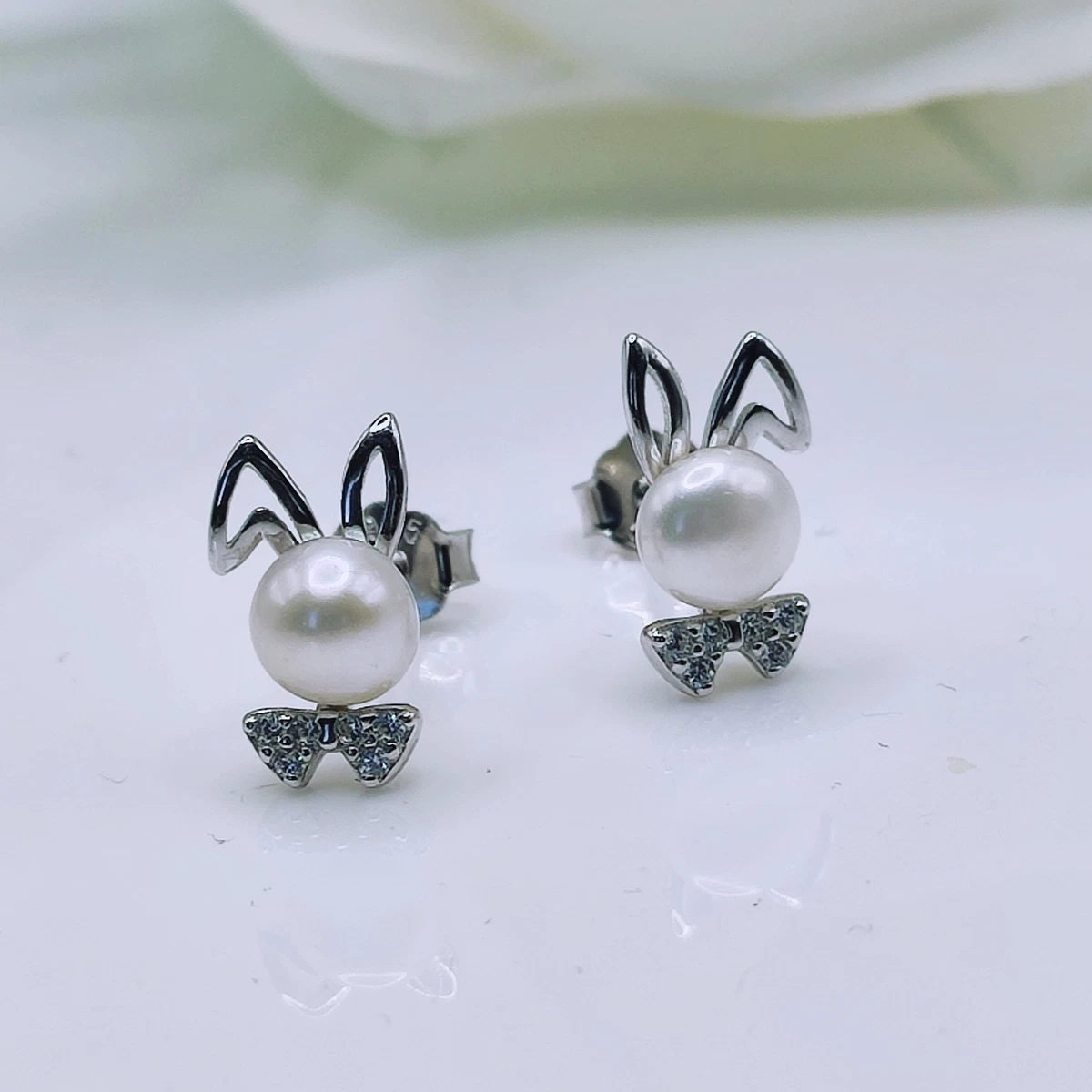Silver clearance playboy earrings