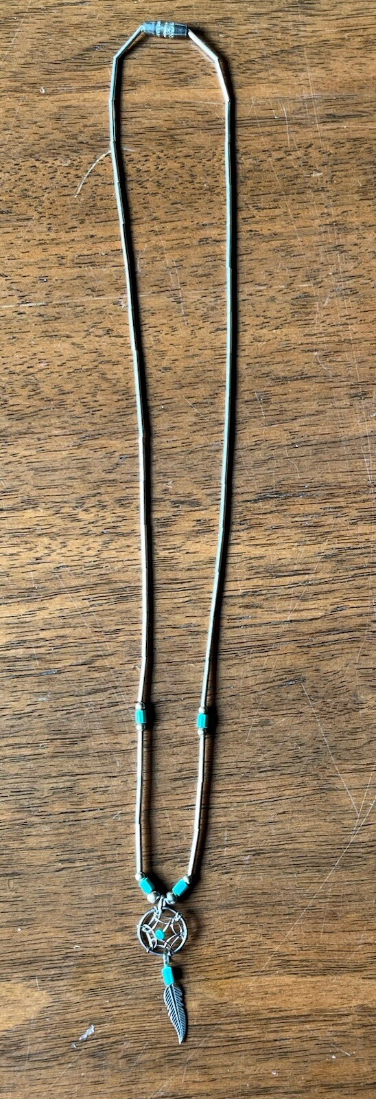 vintage native american liquid silver necklace with small dreamcatcher turquoise