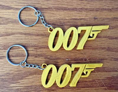 2 James Bond 007 Spy Keychain Spy Key Fob Chain Ring Collectible Gold $3.88 ea.