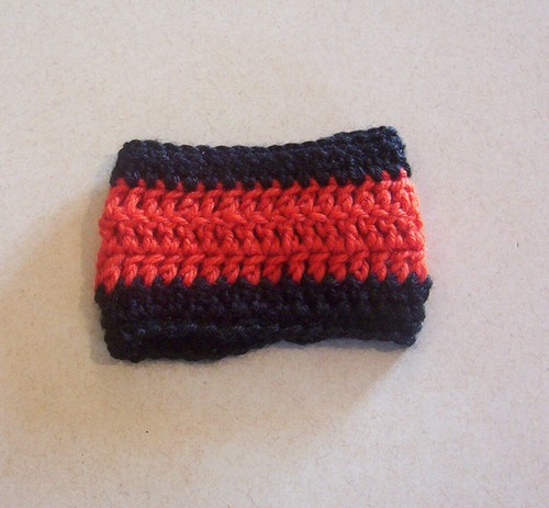 Crochet Black & Orange Stripe Buttoned Coffee Mug Cozy - Picture 4 of 4