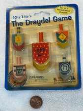 The Draydel Game with 5 tops in original package Dreidel game