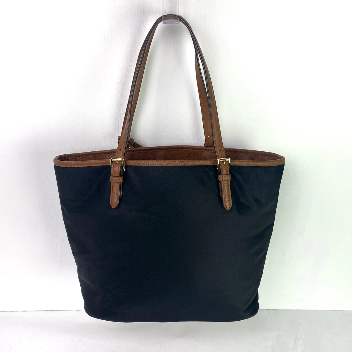 Jet set medium snap pocket tote top