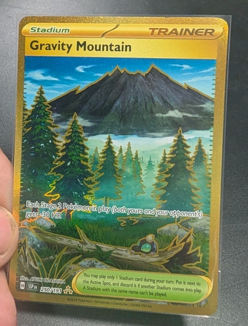 Gravity Mountain 250/191 Hyper Rare Pokemon Card Gold Trainer Surging Sparks NM