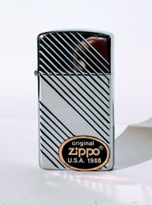 Mini accendino zippo in acciaio rigato anni 90.