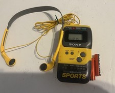 Excellent working Vintage Sony SRF-M70 Walkman Sports FM/AM Radio w/MDR-W14