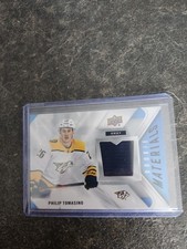 2021-22 Upper Deck Series 2 Rookie Materials Philip Tomasino Card# RM-PT. rookie card picture