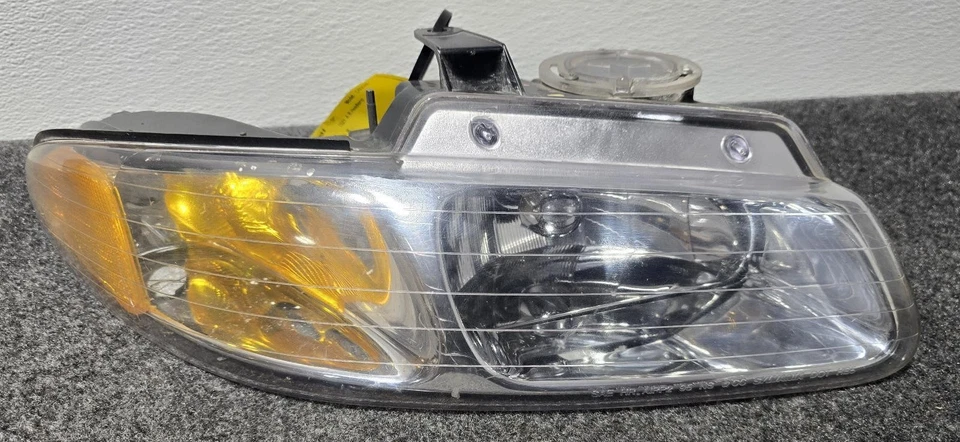 Faro Dodge Caravan R. 96 97 98 99 Foto 2 de 4