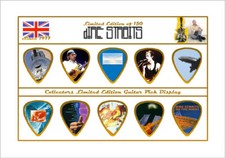 Dire Straits Guitar Picks On Photographic Background Display 10 Guitar Picks