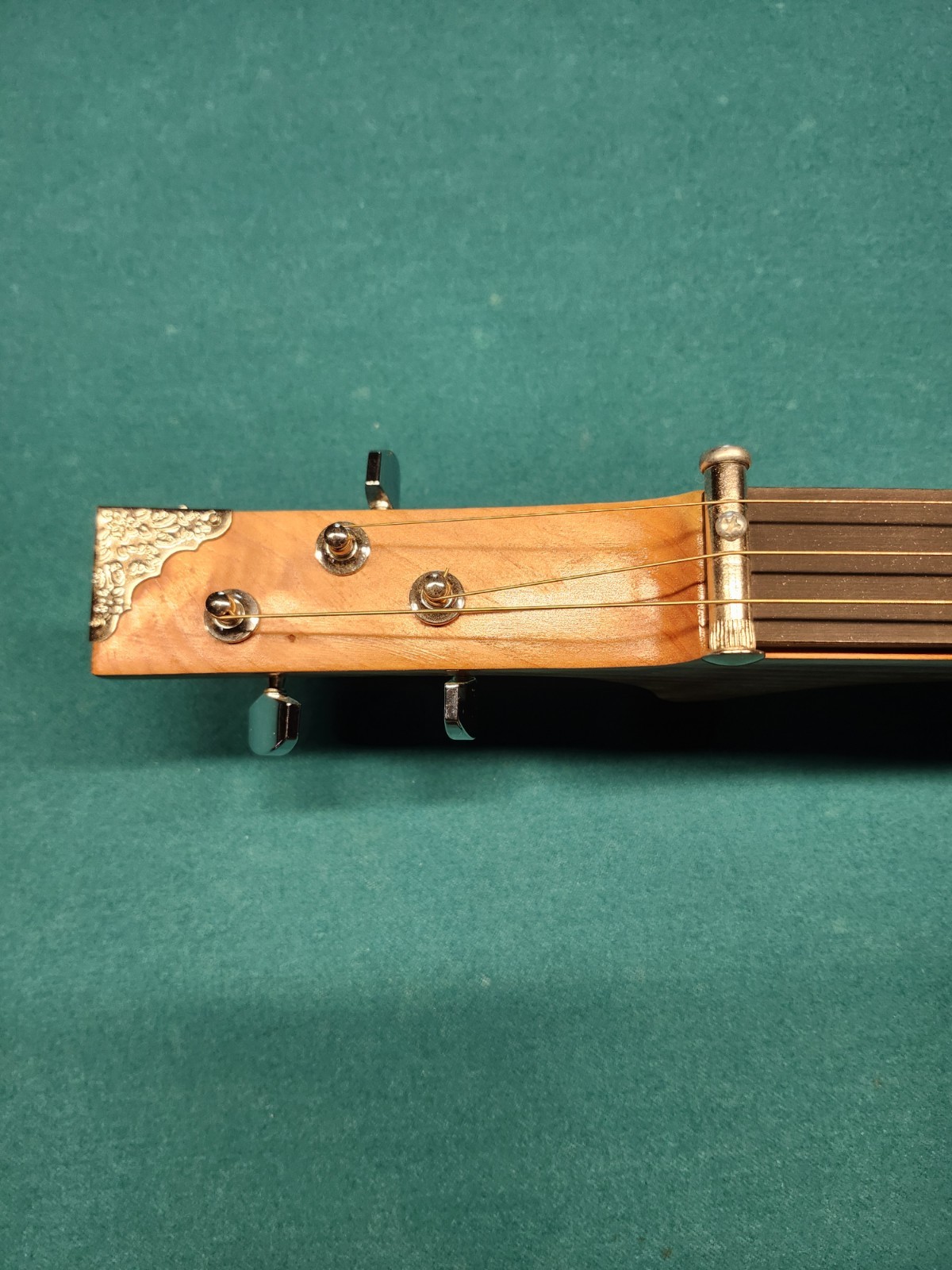 This Is A Unique Instrument  With A Diatonic  Scale. Three String Slide guitar