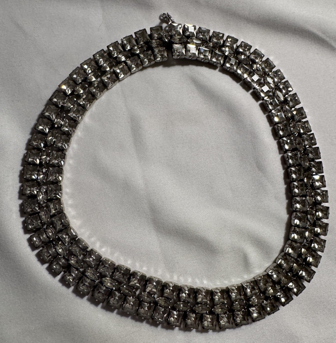 Sterling silver necklace set with smoky gray rhinestones in an Art Deco style