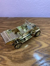 24 karat gold model T model, made with over 40 separate pieces. in great shape.