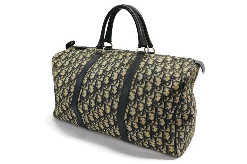 DIOR   WEEKENDER Sac de voyage oblique jacquard beige et noir toile avec bordure cuir