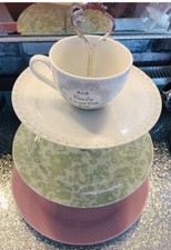CAKE STAND 3 TIER MARKED ON THE BOTTOM “LINEA” UNIQUE DESIGN WITH TEA CUP ON TOP