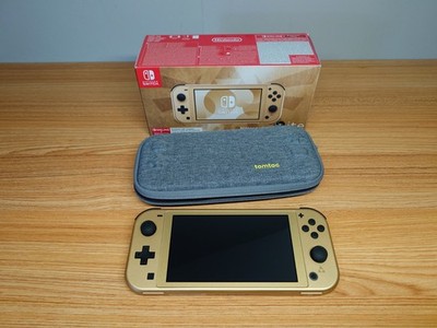 Nintendo Switch Lite Zelda Hyrule Edition in OVP + Tragetasche
