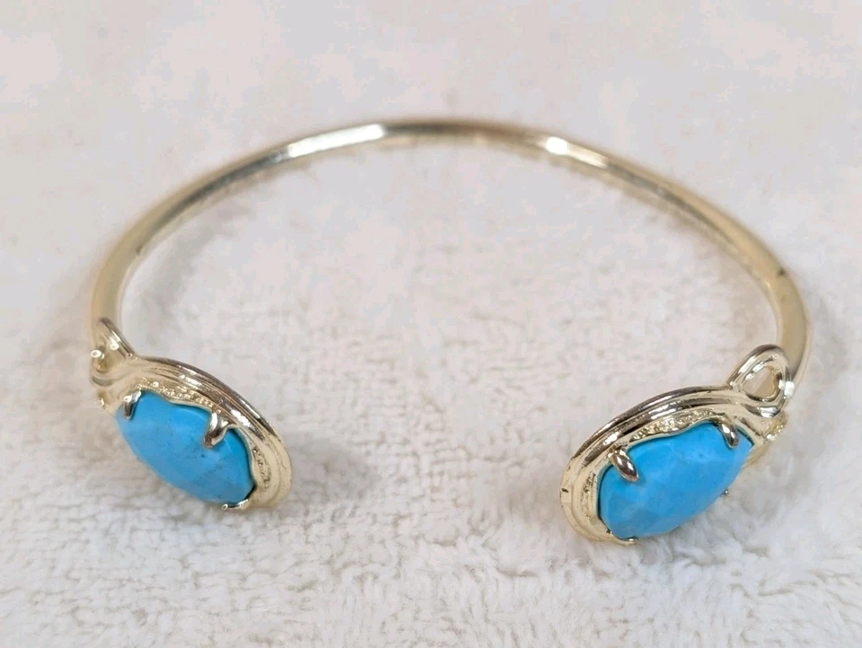 Brazalete abierto Kendra Scott tono dorado piedras azul turquesa para mujer’s Foto 4 de 4